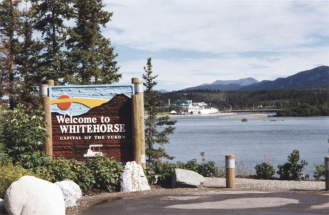 Welcome to Whitehorse sign on South Access Road, 2001