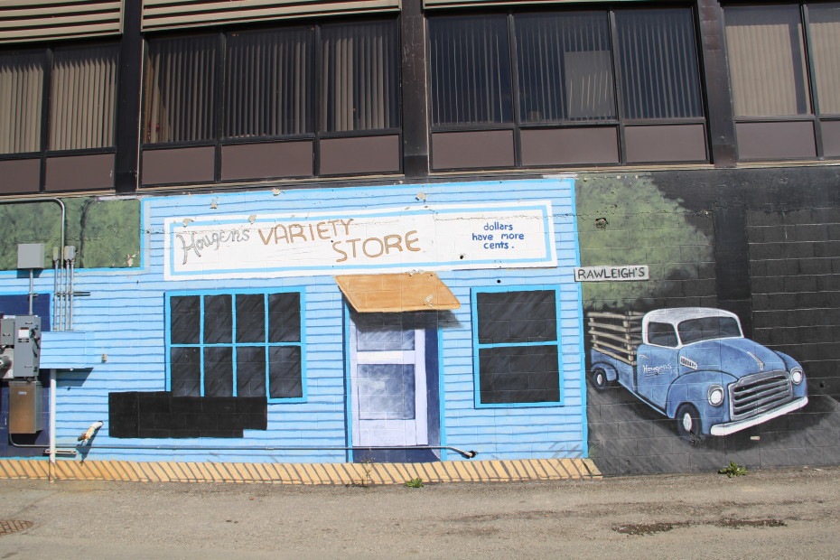 Huge frontier-town mural behind the Hougen's retail complex in Whitehorse, Yukon