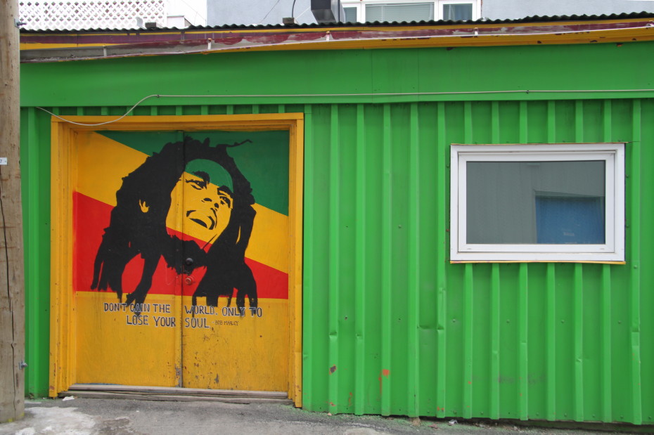 Mural of Bob Marley on the side door of the Pickapeppa Caribbean Soul Food restaurant in Whitehorse, Yukon