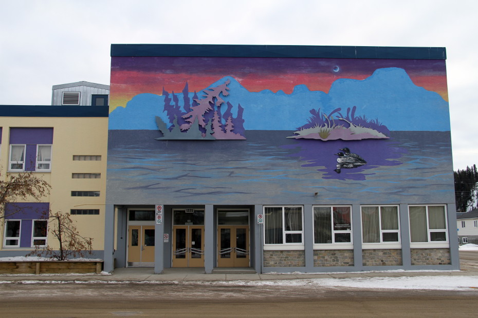 Mural of loons on a lake, painted by Lance Burton and the Youth of Today Society, in Whitehorse, Yukon