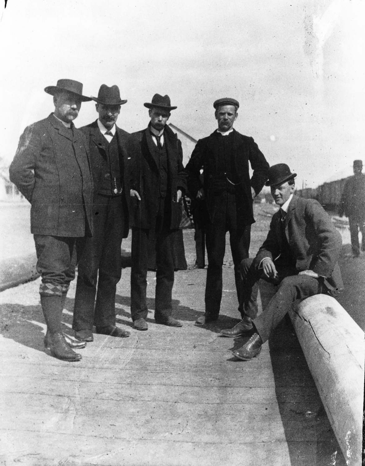 A group of men on Front Street north of the railway depot - Whitehorse, Yukon Territory, 1900
