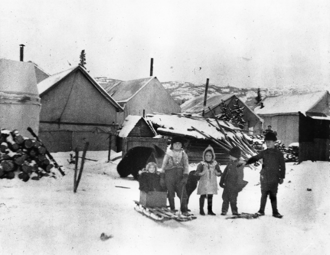 Children with a sled and two dogs - Whitehorse, Yukon Territory, 1900